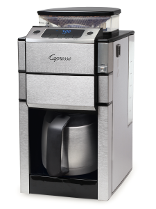 Front right facing view of silver coffee machine featuring a bean to cup grinder and stainless steel thermal carafe. Display features digital clock and options for ground coffee, oily beans, and adjustable cup button.